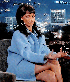 A gif of Rhianna making the money hand gesture while on the Jimmy Kimmel show. 