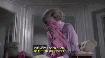 gif of Mia Farrow in the movie &quot;the great gatsby&quot; crying and wiping her tears on a pink shirt with the caption &quot;I&#x27;ve never seen such beautiful shirts before&quot;