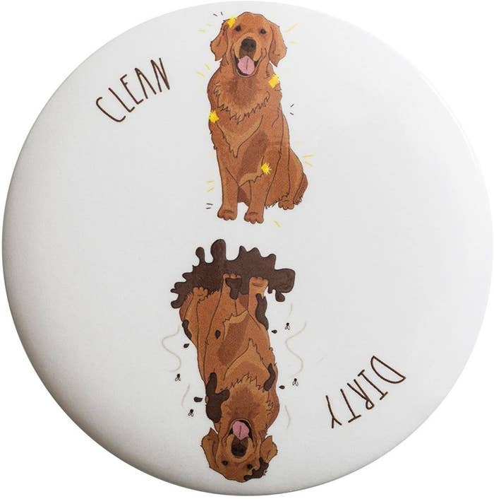 A round white dishwasher magnet with an illustration of a clean golden retriever on the top and a dirty, mud-covered golden retriever on the bottom
