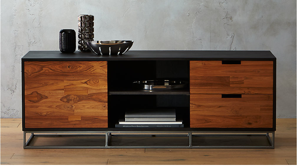 A mixed media credenza made of a dark mango wood and teak with an iron base