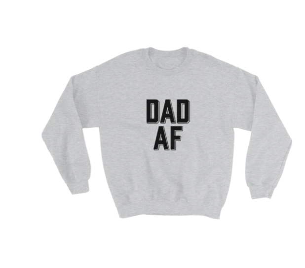 A long-sleeve crewneck sweatshirt with the text &quot;DAD AF&quot; in bold letters across the front in the center