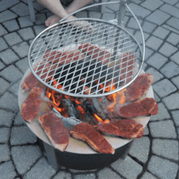 a repeating video gid showing various meats on top of the fire pit edges