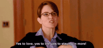 Liz Lemon from 30 Rock extending her arms and saying &quot;yes to love, yes to life, yes to staying in more&quot; 