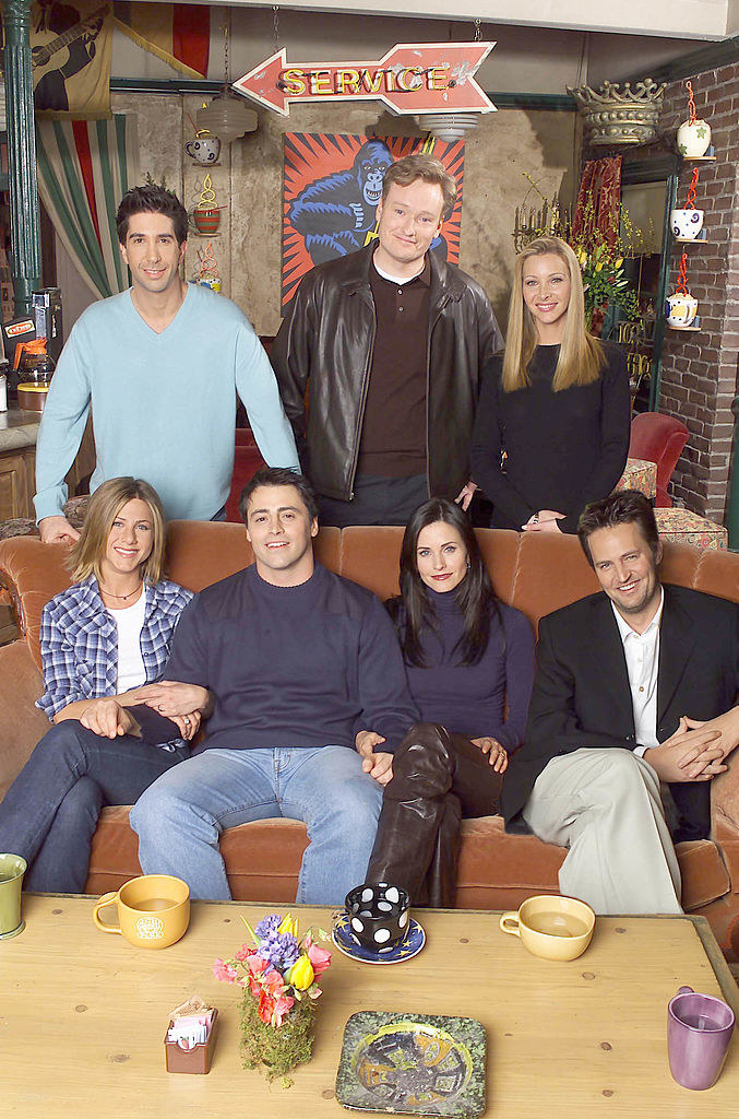 The cast of &quot;Friends&quot; pose for a picture alongside chat show host, Conan O&#x27;Brien.