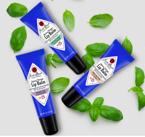 Three tubes of the balm (the tube is the shape of a Carmex tube or small hand lotion) in different flavors: black tea and blackberry, natural mint and shea butter, and shea butter and vitamin E