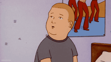 A gif of Bobby Hill shaking his hands in excitement