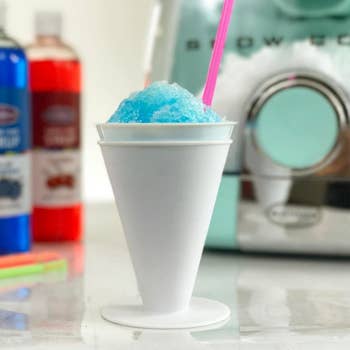 a blue snow cone in a white paper cup with a pink straw