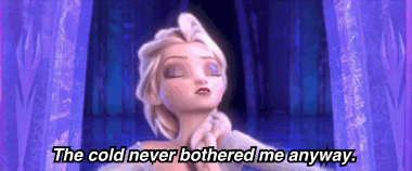 elsa from disney's frozen saying "the cold never bothered me anyway" then turning to slam her ice castle door