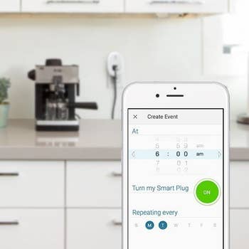 The Kasa app opened to a page where the user can schedule recurring times for the Smart Plug to be turned on