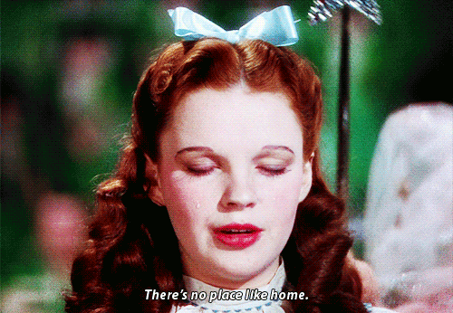 Dorothy from the Wizard of Oz closing her eyes and saying "there's no place like home"