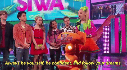 JoJo accepts an award at the Nickelodeon Kids' Choice Awards.