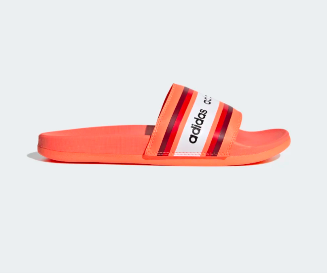 Bright cream orange adidas slides