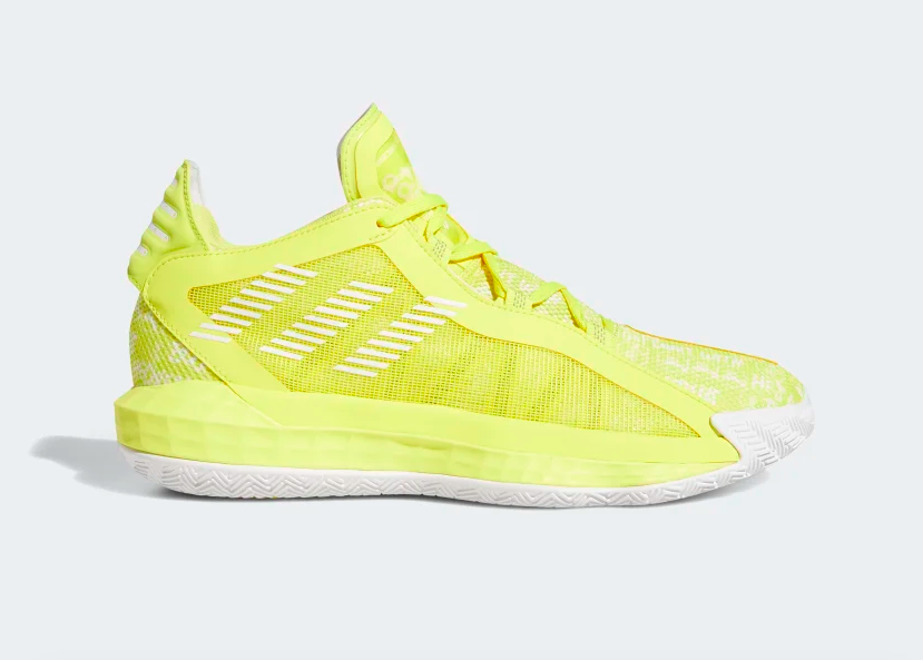 Bright highlighter yellow Adidas sneakers