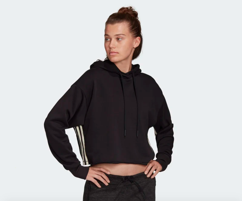Model wearing the black cropped hoodie