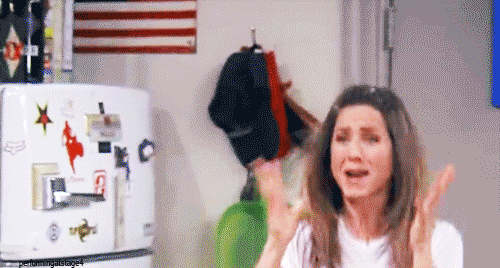 Rachel Green from "Friends" jumps up and down with excitement in her kitchen