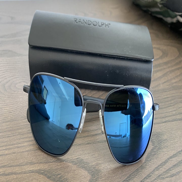 A pair of Randolph Aviator sunglasses head-on view with black case