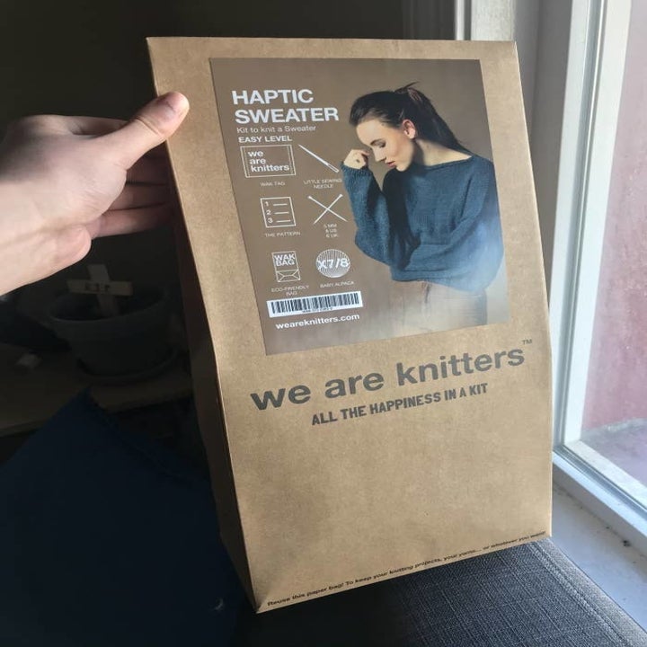 Haptic sweater kit in a brown bag