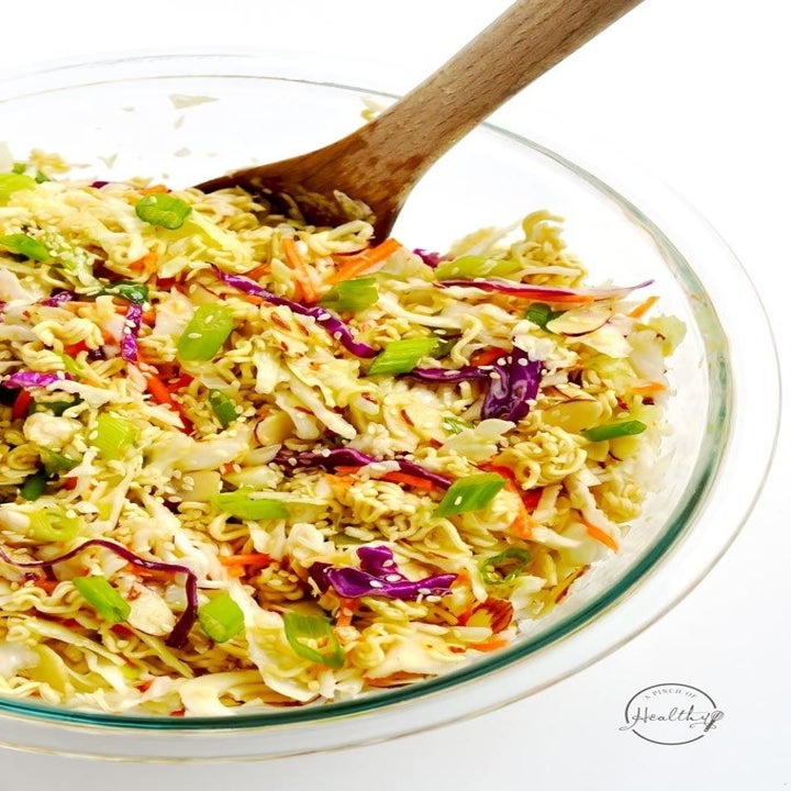 A big bowl of crunchy ramen salad with homemade Asian-inspired dressing.