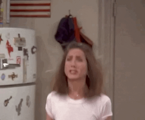 Jennifer Anniston as Rachel Green jumping up and down with excitement