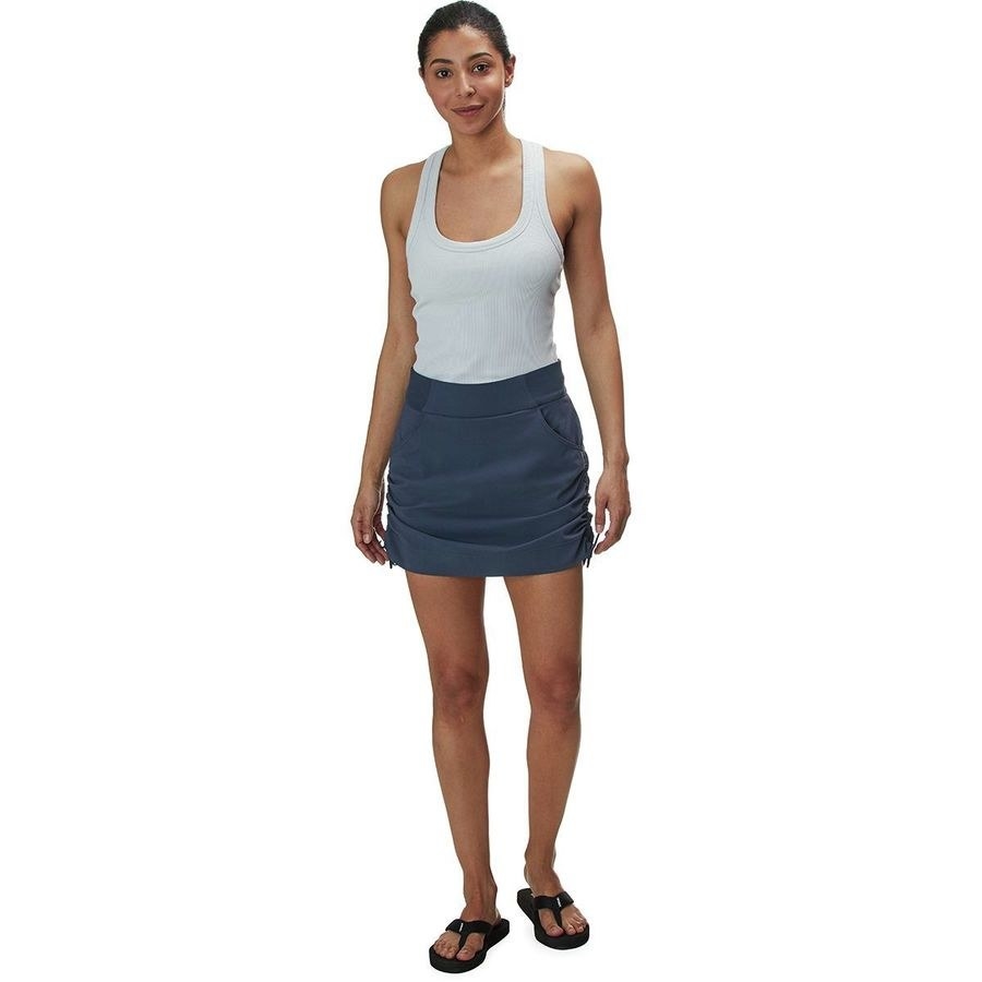 Model wearing the skirt in blue