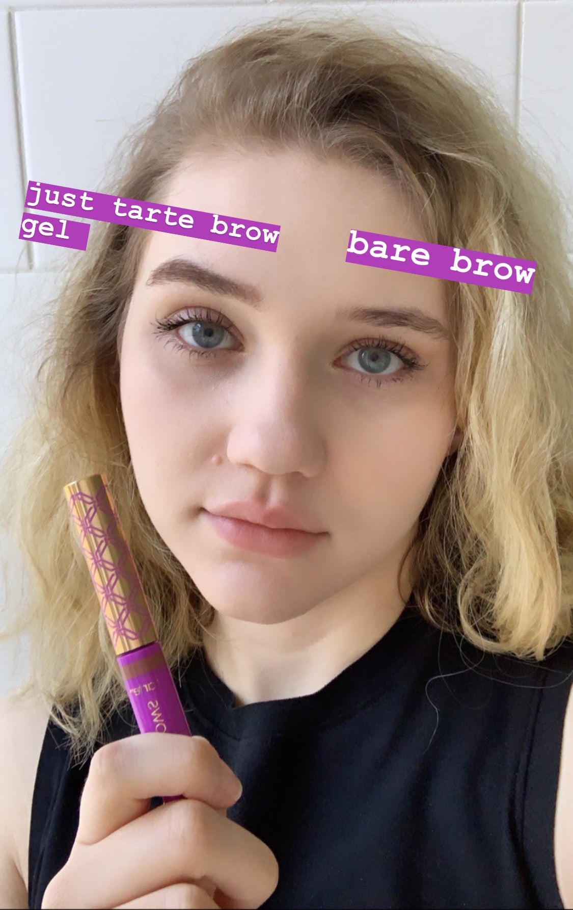 BuzzFeed Shopping reviewer holding the brow gel with one eyebrow done and one bare to show the difference 