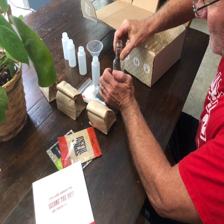 A reviewer getting ready to mix ingredients to make hot sauce 