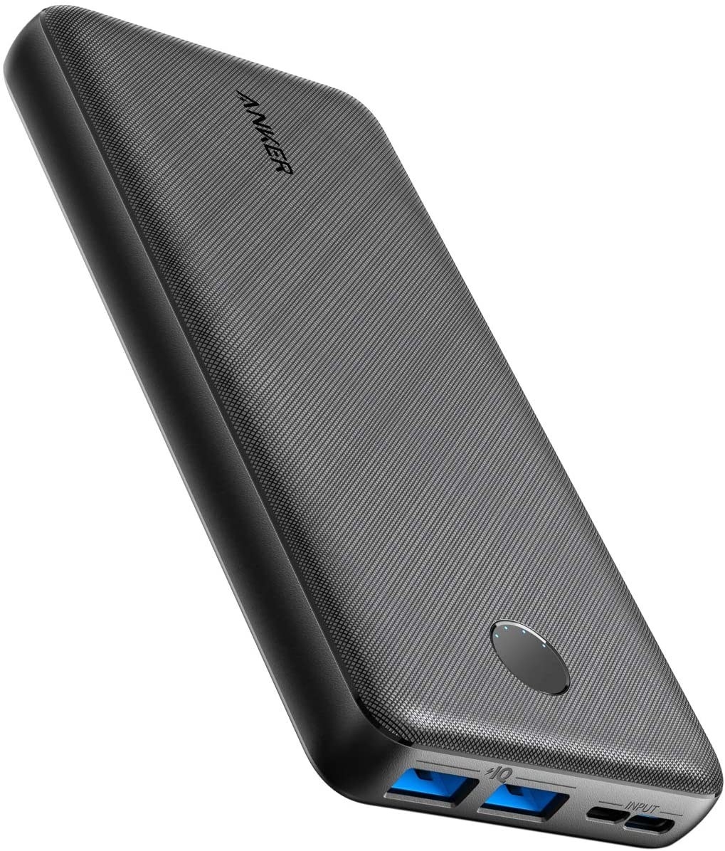 A close-up of a black Anker portable charger with two USB ports