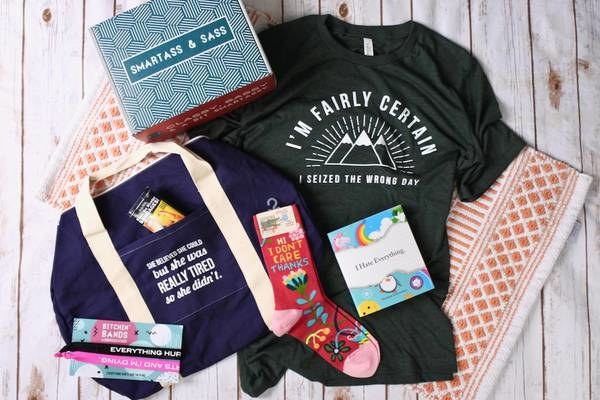 An assortment of goodies, including a T-shirt, a tote, socks, and more
