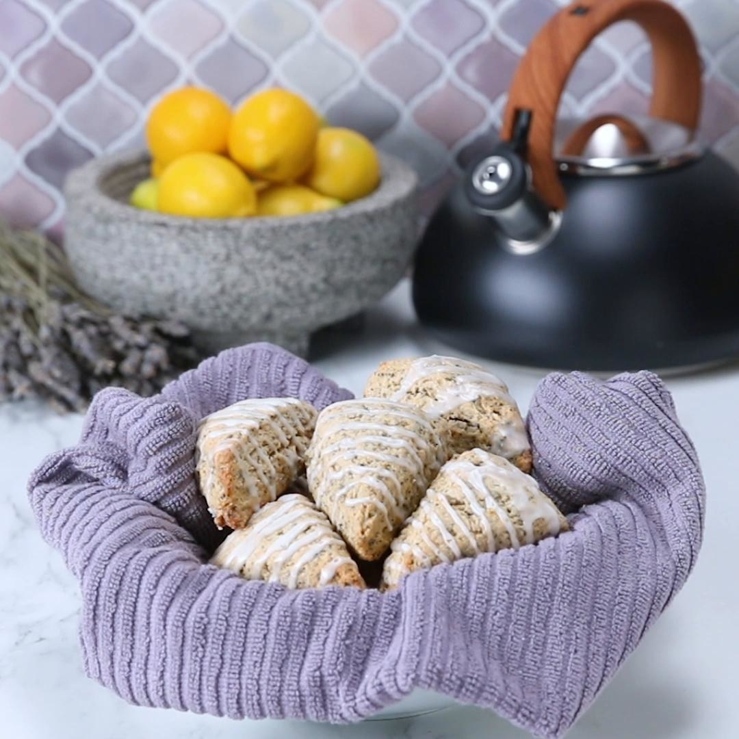 five lavender lemon scones on purple towel