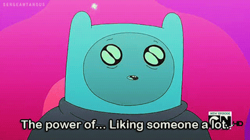 Finn from Adventure Time whispers &quot;The power of...liking someone a lot&quot; with huge eyes and stars floating behind him