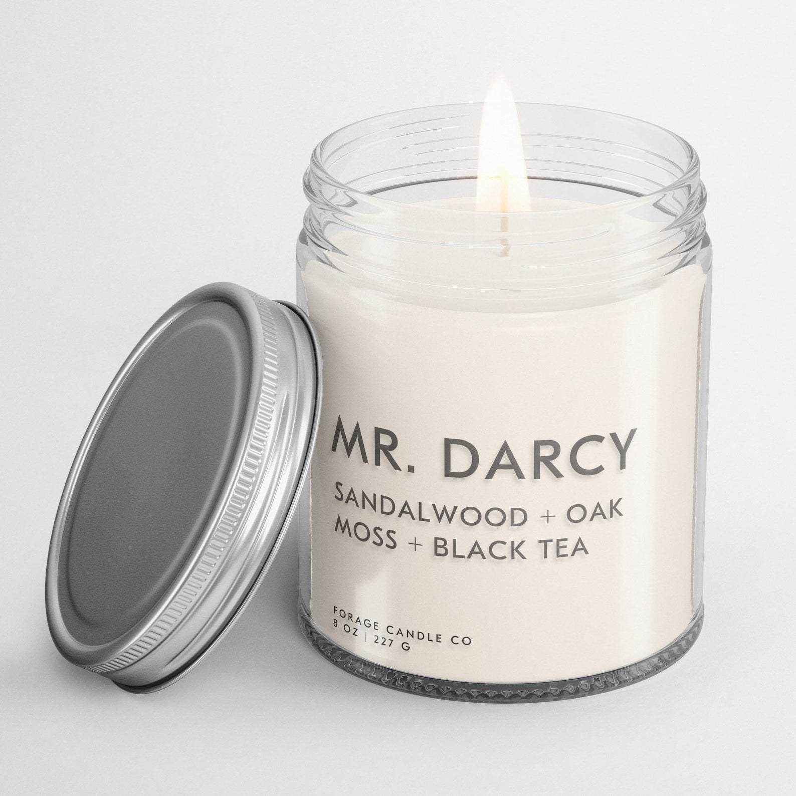 A Mr. Darcy candle that smells like sandalwood, oak moss, and black tea 