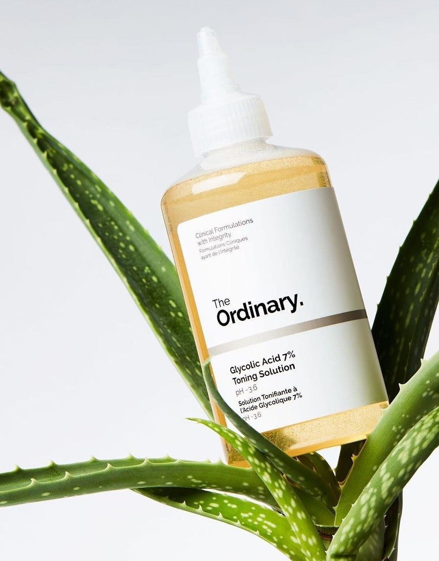 clear plastic bottle with white nozzle labeled "the Ordinary"