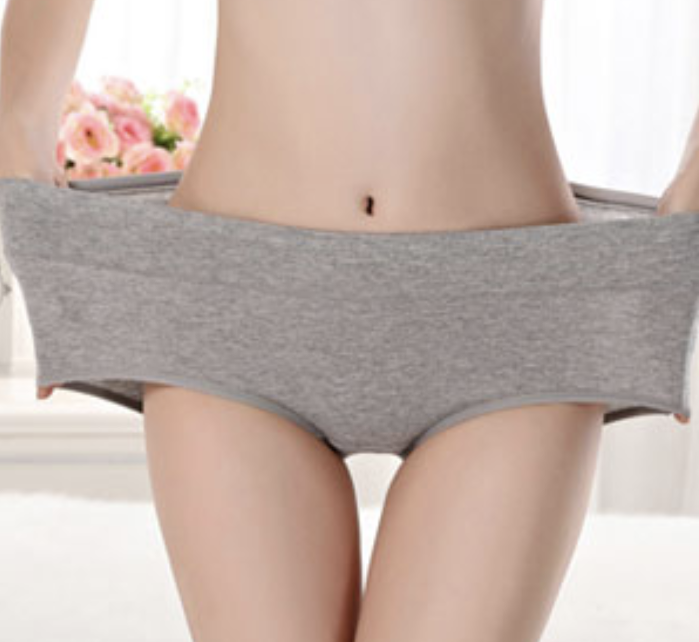 Model showing stretchiness of underwear