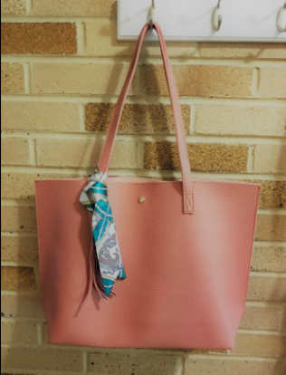 another reviewer's pic of pink bag hanging on wall hook