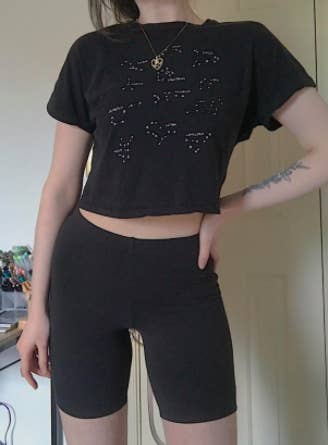reviewer pic of black bike shorts styled with boxy black tee