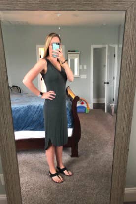reviewer wearing the dress in gray