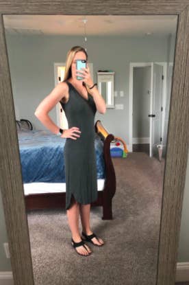 reviewer wearing the dress in gray