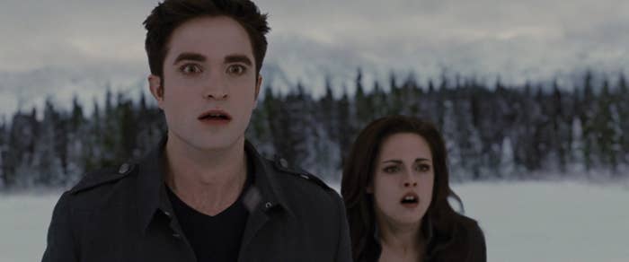 Edward and Bella reacting in shock during Breaking Dawn Part 2 fight scene.