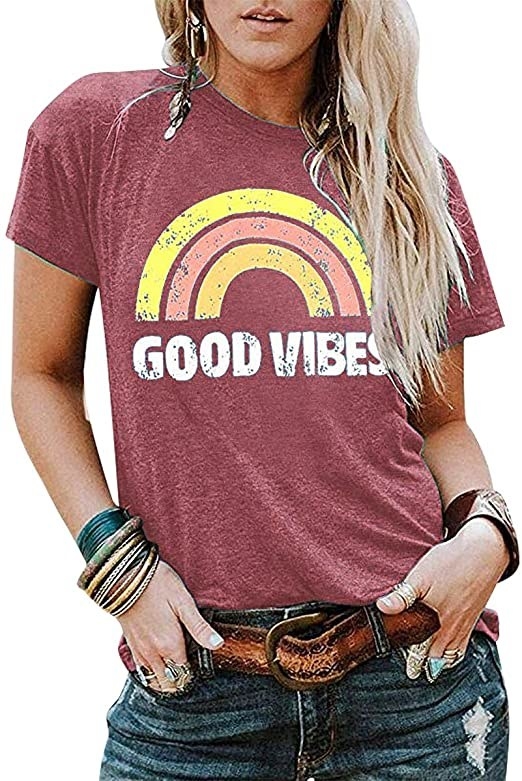 modeling wearing the shirt that says &quot;good vibes&quot;