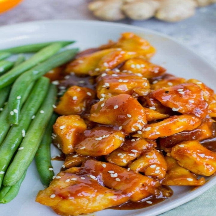 Homemade orange chicken on a plate.