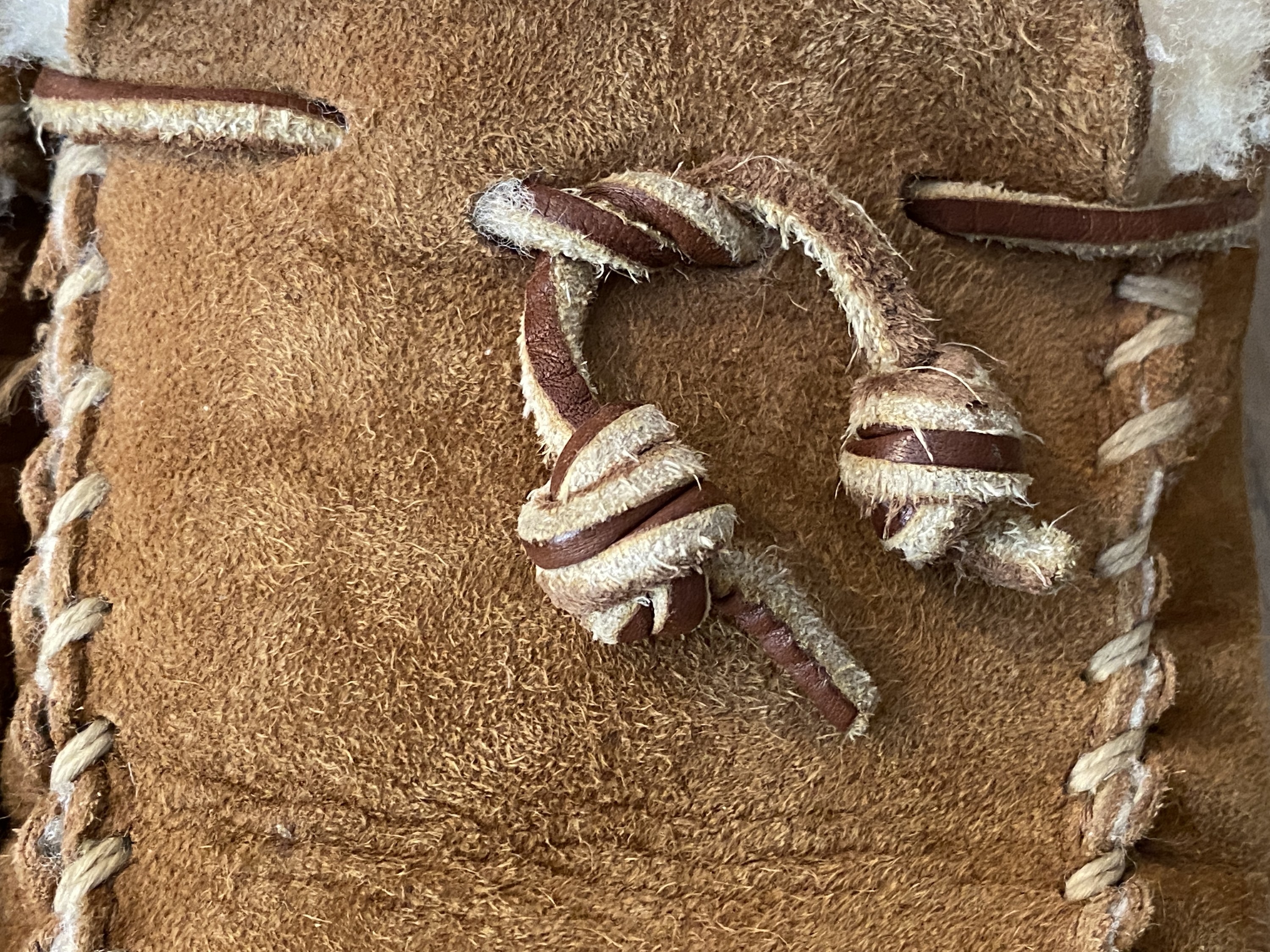 A close-up of the BuzzFeed editor&#x27;s barrel knot on a moccasin 