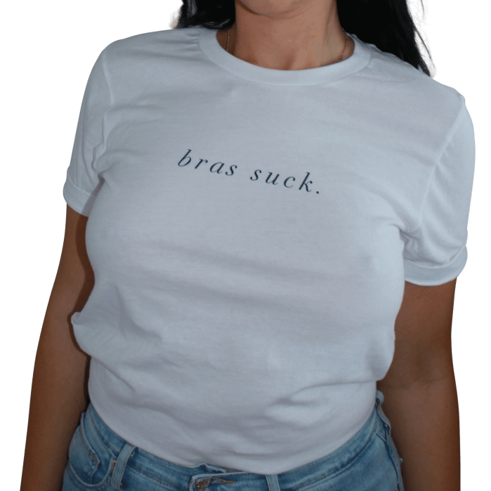 A model wearing the white short-sleeve T-shirt that says &quot;bras suck&quot;