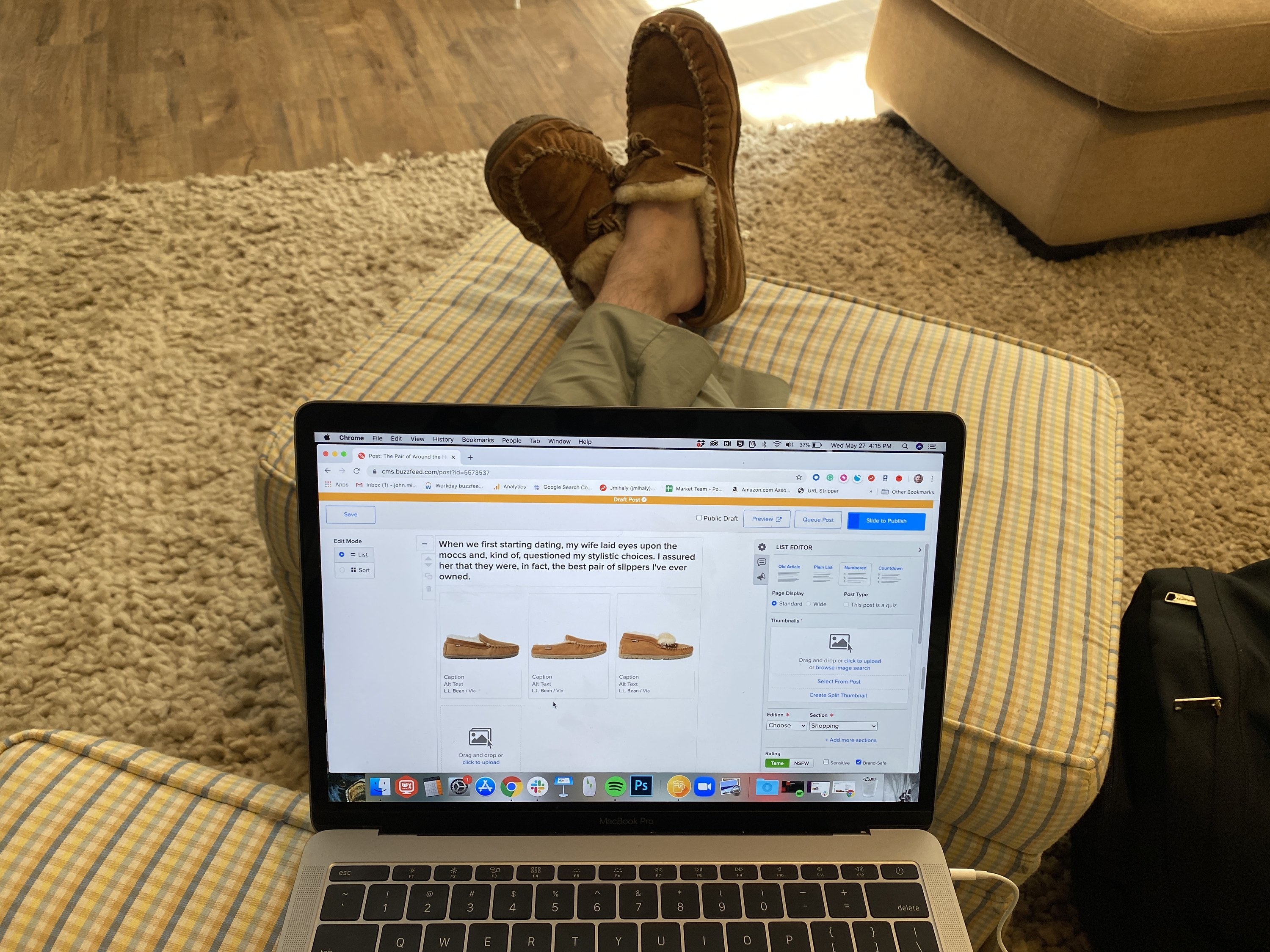BuzzFeed Editor working on this very story on a laptop while wearing moccasins