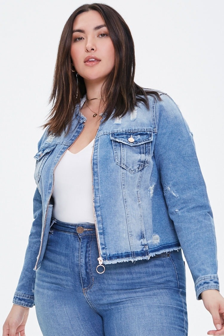 model wearing the jacket in faded blue 