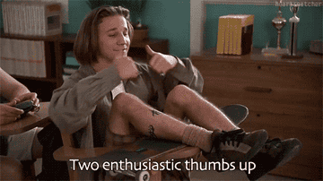 gif of Breckin Meyer in &quot;Clueless&quot; labeled &quot;two enthusiastic thumbs up&quot; 