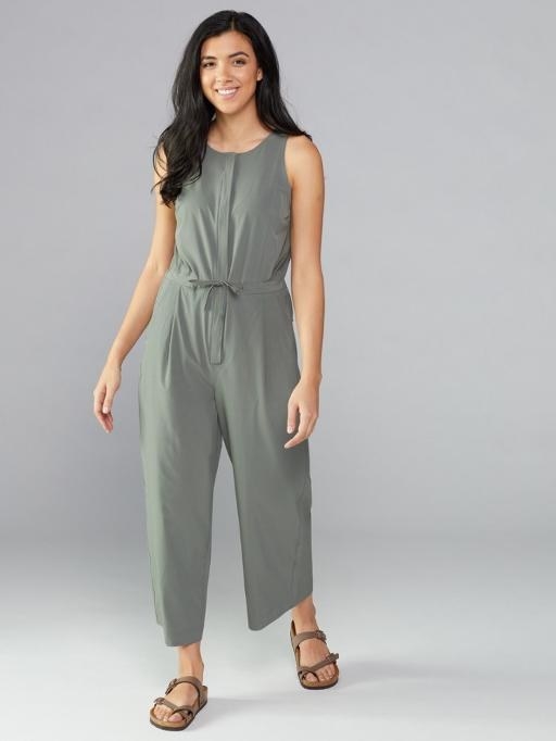 Model wearing the jumpsuit in sage green
