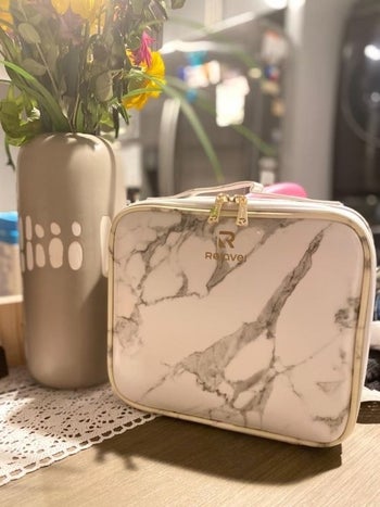 Another reviewer's image of the makeup bag's design in marble 
