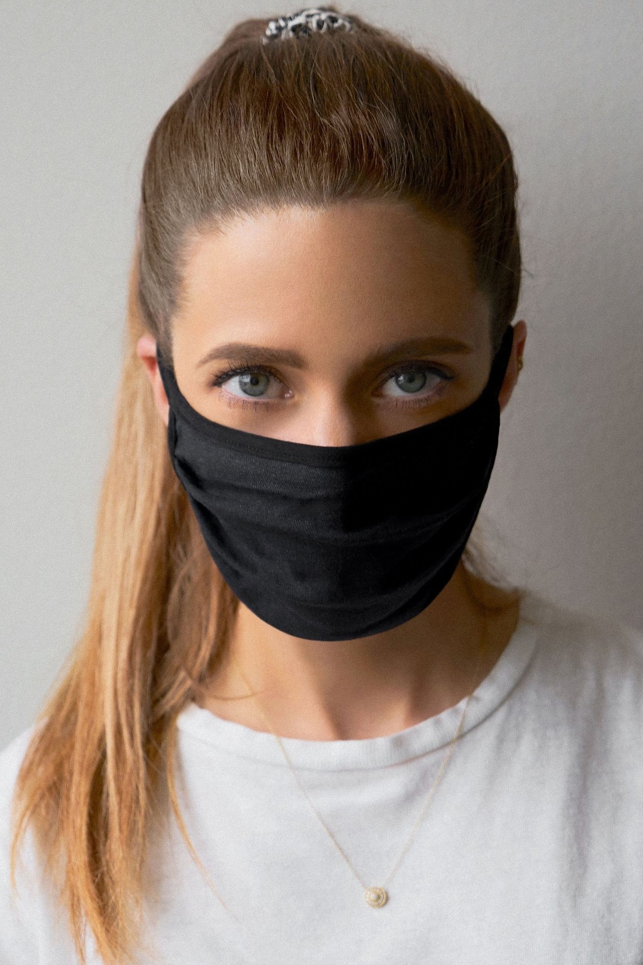 model wearing dark heather gray mask 