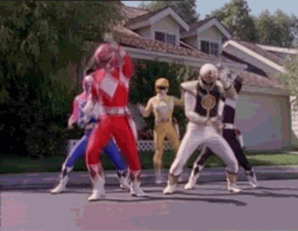 Gif of the Power Rangers doing a coordinated dance 