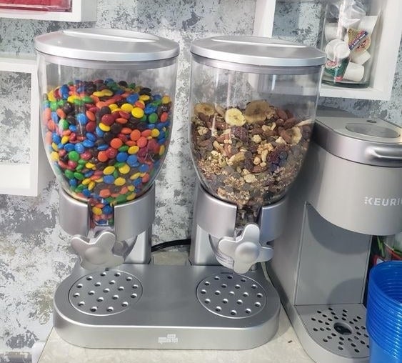 Reviewer's picture of the food dispenser with M&M's and granola